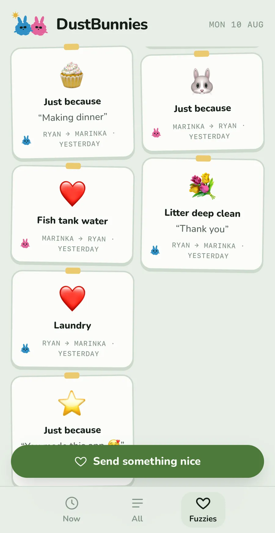 The Fuzzies wall: cards pinned with washi tape, each a small emoji gift sent between us, labeled with the chore it was thanking.